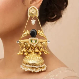 A girl wearing kashmiri earrings.